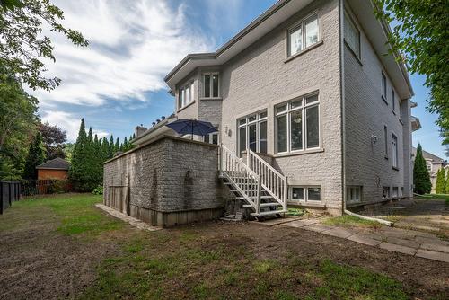 Face arrière - 136 Rue Jean-De Ronceray, Carignan, QC - Outdoor With Exterior