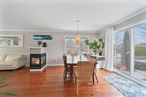 Salle à manger - 52 Rue De Lourtel, Saint-Jean-Sur-Richelieu, QC - Indoor With Fireplace