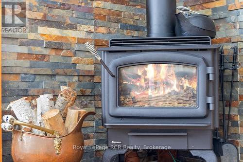 282848 Normanby-Bentinck Townline, West Grey, ON - Indoor Photo Showing Other Room With Fireplace