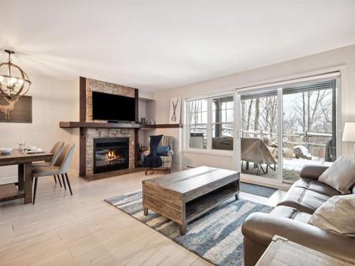 Living room - 3-250 Rue Du Mont-Plaisant, Mont-Tremblant, QC - Indoor Photo Showing Living Room With Fireplace
