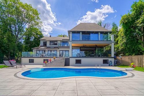 Face arrière - 598 Rue Main, Hudson, QC - Outdoor With In Ground Pool With Backyard