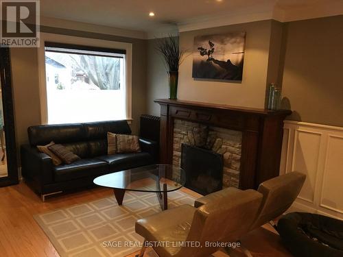 569 Soudan Avenue, Toronto, ON - Indoor Photo Showing Living Room With Fireplace