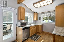 Kitchen With W/O  To Deck For Outdoor Entertaining - 