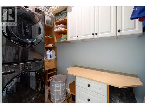 Laundry (in Primary Bedroom closet) - 6984 Highway 6, Coldstream, BC - Indoor Photo Showing Laundry Room