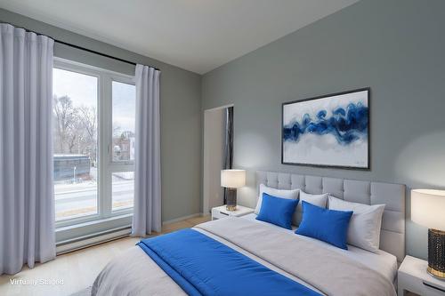 Chambre à coucher - 204-10700 Rue Berri, Montréal (Ahuntsic-Cartierville), QC - Indoor Photo Showing Bedroom