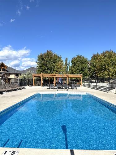 113-100 Bighorn Boulevard, Radium Hot Springs, BC - Outdoor With In Ground Pool With Backyard