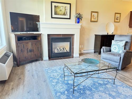113-100 Bighorn Boulevard, Radium Hot Springs, BC - Indoor Photo Showing Living Room With Fireplace