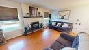 316 22Nd Avenue, Cranbrook, BC  - Indoor Photo Showing Living Room With Fireplace 