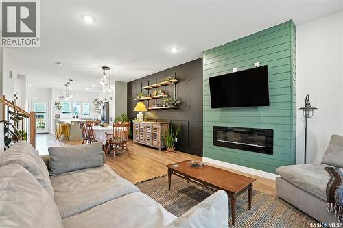 1124 9Th Street E, Saskatoon, SK - Indoor Photo Showing Living Room With Fireplace