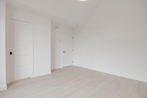Chambre à coucher principale - 70 Rue De La Traverse, Boischatel, QC - Indoor Photo Showing Other Room