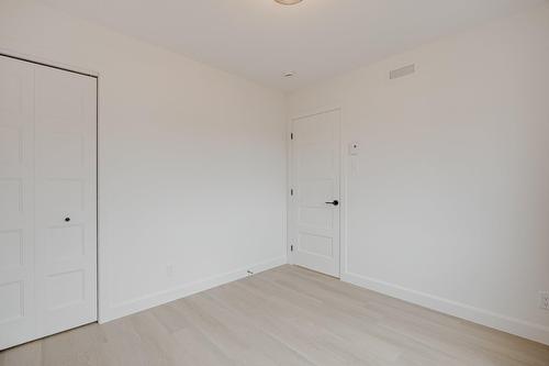 Chambre à coucher - 70 Rue De La Traverse, Boischatel, QC - Indoor Photo Showing Other Room