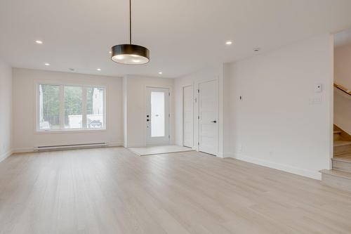 Salle à manger - 70 Rue De La Traverse, Boischatel, QC - Indoor Photo Showing Other Room