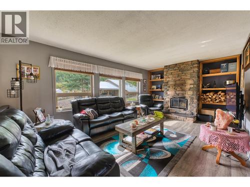 348 Creighton Valley Road, Lumby, BC - Indoor Photo Showing Living Room With Fireplace