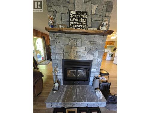1862 Birch Avenue, Quesnel, BC - Indoor Photo Showing Living Room With Fireplace