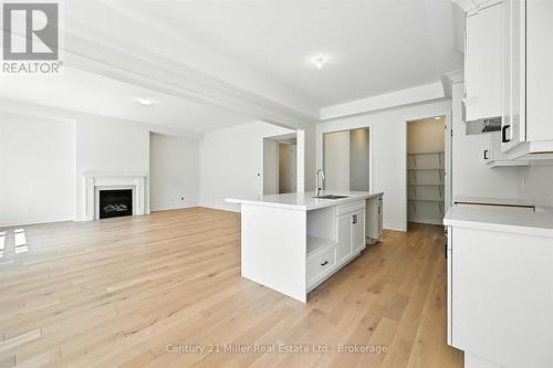 3250 Millicent Avenue, Oakville (Go Glenorchy), ON - Indoor With Fireplace