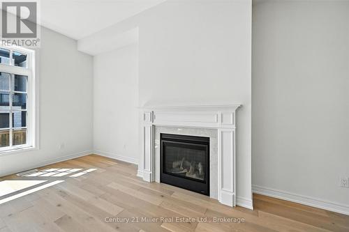 3250 Millicent Avenue, Oakville (Go Glenorchy), ON - Indoor Photo Showing Living Room With Fireplace
