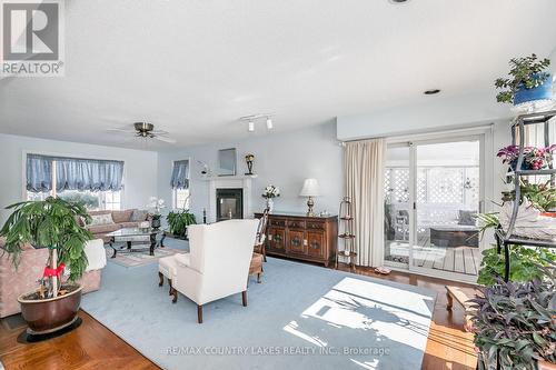 98 Turtle Path, Ramara, ON - Indoor Photo Showing Living Room With Fireplace