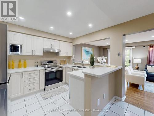 96 - 5230 Glen Erin Drive, Mississauga, ON - Indoor Photo Showing Kitchen With Double Sink