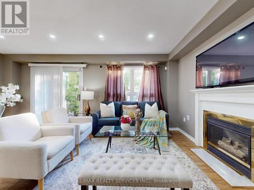 96 - 5230 Glen Erin Drive, Mississauga, ON - Indoor Photo Showing Living Room With Fireplace
