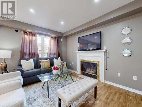 96 - 5230 Glen Erin Drive, Mississauga, ON - Indoor Photo Showing Living Room With Fireplace