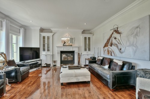 Family room - 6 Rue De Rambouillet, Blainville, QC - Indoor Photo Showing Living Room With Fireplace