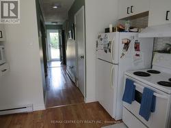 view of hallway from front door to kitchen - 