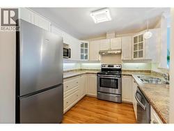 contemporary kitchen with newer SS Appliances - 