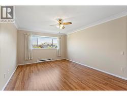 King Sized Master Primary Bedroom with ceiling fan - 