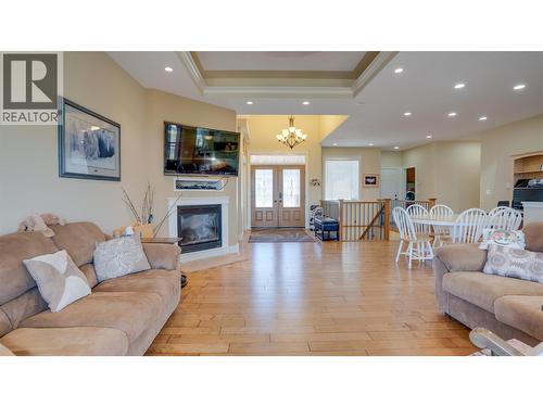 567 Mt Ida Drive, Coldstream, BC - Indoor Photo Showing Living Room With Fireplace