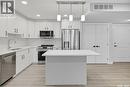 208 318 108Th Street W, Saskatoon, SK  - Indoor Photo Showing Kitchen With Stainless Steel Kitchen With Upgraded Kitchen 