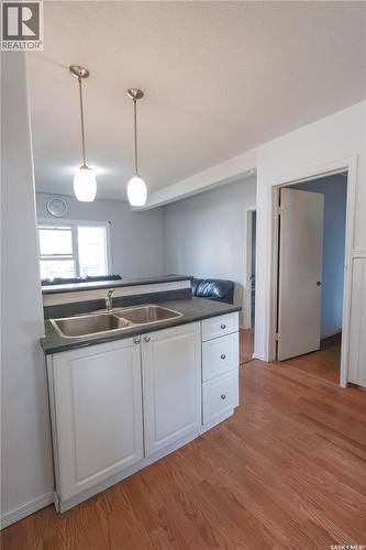 707 5Th Street E, Prince Albert, SK - Indoor Photo Showing Kitchen With Double Sink