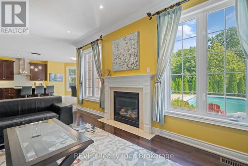 6440 St. Michael Avenue, Niagara Falls (Forestview), ON - Indoor Photo Showing Living Room With Fireplace