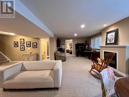 Lower Family Room - 11 - 500 Lakeview Drive, Woodstock (Woodstock - North), ON - Indoor With Fireplace