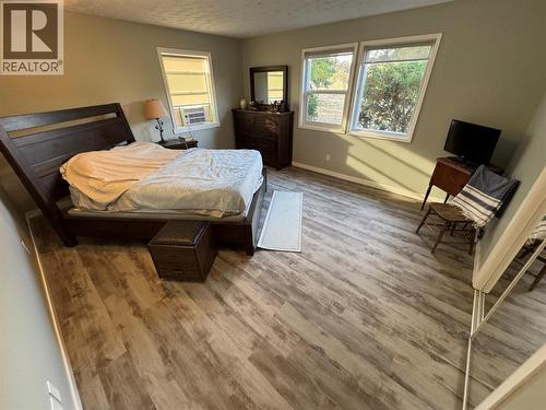 New Flooring & Windows in Master - 10108 Venables Drive, Coldstream, BC - Indoor Photo Showing Bedroom