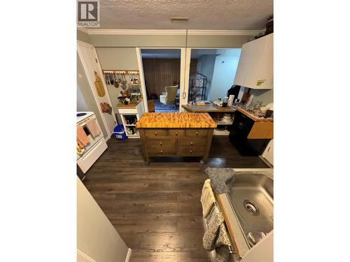 New Flooring in Kitchen Suite - 10108 Venables Drive, Coldstream, BC - Indoor Photo Showing Other Room