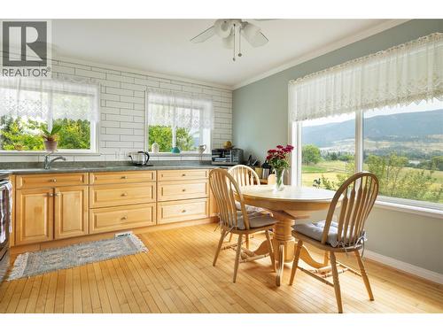 Lots of Cabinetry - 10108 Venables Drive, Coldstream, BC - Indoor Photo Showing Dining Room