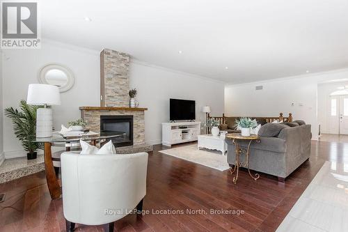 54 Royal Beech Drive, Wasaga Beach, ON - Indoor Photo Showing Living Room With Fireplace
