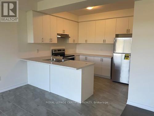 10 Hillcroft Way, Kawartha Lakes, ON - Indoor Photo Showing Kitchen With Double Sink