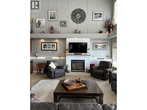 4782 Telqua Drive, 108 Mile Ranch, BC - Indoor Photo Showing Living Room With Fireplace
