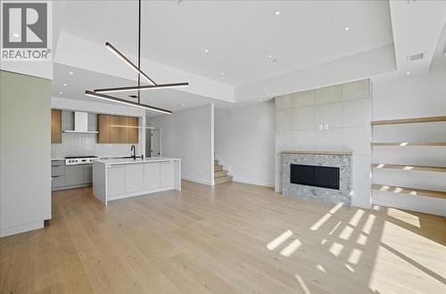 266 Baker Street Unit# 17, Nelson, BC - Indoor Photo Showing Kitchen With Fireplace