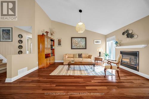 128 Annapolis Circle, Ottawa, ON - Indoor Photo Showing Living Room With Fireplace