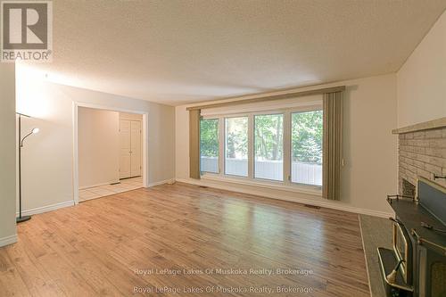 115 Douglas Street, Gravenhurst (Muskoka (S)), ON - Indoor Photo Showing Other Room With Fireplace