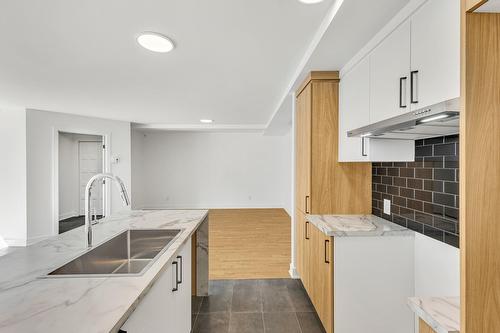 Cuisine - 9334 Rue Riverin, Brossard, QC - Indoor Photo Showing Kitchen With Double Sink