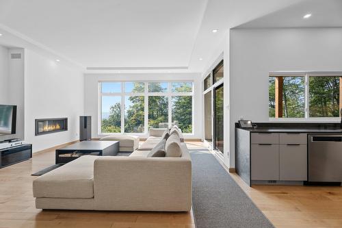 Salon - 819 Rue De La Campagne, Sainte-Adèle, QC - Indoor Photo Showing Living Room With Fireplace