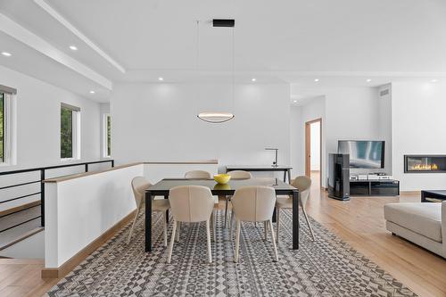 Salle à manger - 819 Rue De La Campagne, Sainte-Adèle, QC - Indoor Photo Showing Other Room With Fireplace