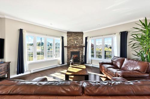 Living room - 1049 Rue Des Chevaliers, Prévost, QC - Indoor Photo Showing Living Room With Fireplace