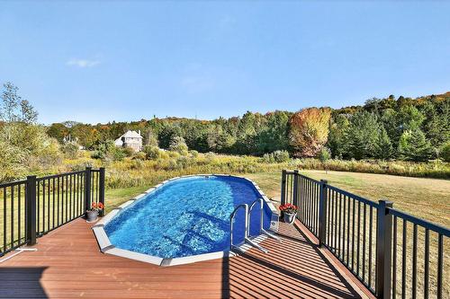 Pool - 1049 Rue Des Chevaliers, Prévost, QC - Outdoor With Above Ground Pool