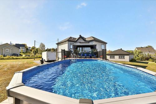 Pool - 1049 Rue Des Chevaliers, Prévost, QC - Outdoor With Above Ground Pool With Backyard With Exterior