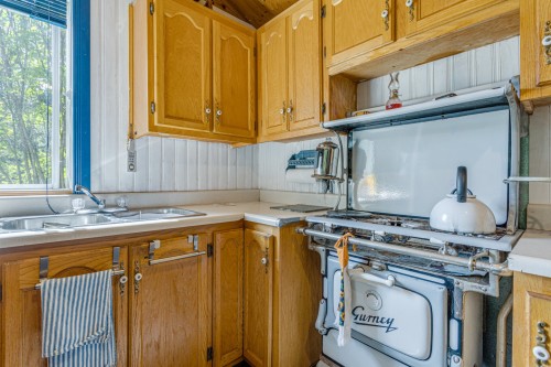 Cuisine - 134 2E Avenue Belleville, Sainte-Mélanie, QC - Indoor Photo Showing Kitchen With Double Sink