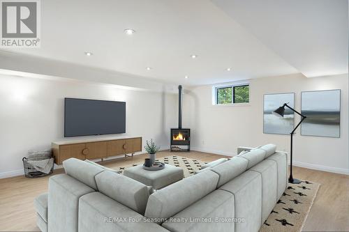 Staged Lower level - 159 Indian Circle, Blue Mountains, ON - Indoor Photo Showing Living Room With Fireplace